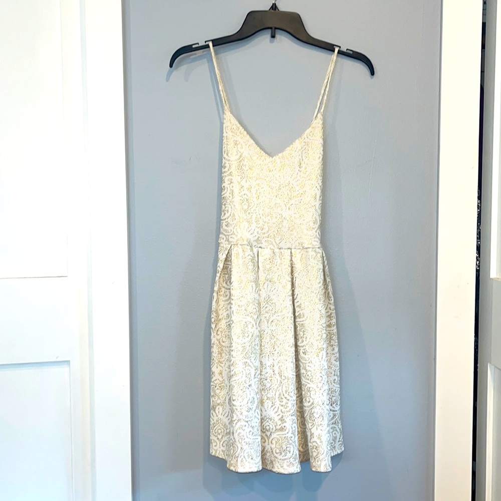 Pretty white with gold design